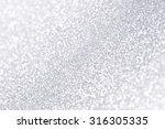 Abstract silver and white sparkle glitter background