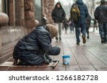 Hungry Homeless Beggar Woman...