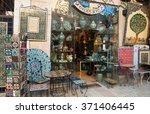 Small photo of JERUSALEM, ISRAEL - FEBRUARY 19, 2014: Famous hand painted ceramic tiles and pottery shop of Arman Darian. Armenian pottery is developed in Jerusalem since early days of the British Mandate.