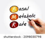 Small photo of BMR - Basal Metabolic Rate acronym, medical concept background