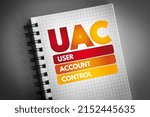 Small photo of UAC - User Account Control acronym on notepad, technology concept background