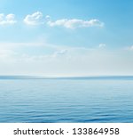 Blue Sea And Clouds On Sky