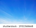 Blue sky background and white clouds soft focus, and copy space horizontal shape
