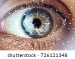 The human eye with the image of the brain in the pupil. The concept of artificial intelligence and the limitless possibilities of the mind
