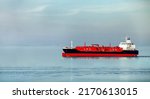 Small photo of Side view oil and gas petrochemical tanker offshore in opensea, Refinery industry cargo ship, Oil product tanker and LPG tanker at sea view from above, Aerial view oil tanker ship vessel.