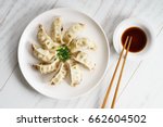 plate of Japanese gyoza, dumplings snack , with soy sauce