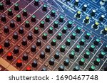 Controllers on professional audio mix pult. Professional DJ sound mixer.