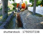 Fiber optic cable laying in the ground, buried cable for faster internet in rural region, near the village Eschede, district Celle, Lower Saxony, Germany