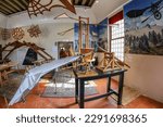 Small photo of VENICE, ITALY-MARCH 18, 2023: Inside of the Leonardo da Vinci Museum. A collection of machines built on the basis of Leonardo da Vinci's designs, in real size. All machines work and many can be tried.
