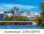 Small photo of Strasbourg, Alsace, France - May 4, 2023: View from the water canal of the building of the European Court of Human Rights (ECHR, ECtHR), designed by the Italian-British architect Richard Rogers.