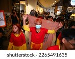 Small photo of 2022,November,19,Bangkok,Thailand,A small group of pro-democracy march from Siam Paragon to Central world to express their angry of the protesting against the violent crackdown of the protest at Din S