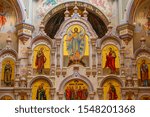 Small photo of Minsk, Belarus - June, 2019. Closeup of sacrarium of the Church of All Saints with image of Jesus Christ and saints