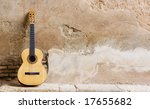 Spanish Guitar On Old Wall ...