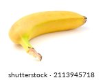 Close-up of one banana lying isolated on white background.