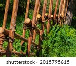 Small photo of The roundpole fence is a wooden fence typical to the countryside in Sweden, Norway, Finland and Estonia. It is normally made from unbarked and unsplit youngish trees mostly spruce or juniper.