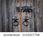 old wooden door with metal... | Shutterstock . vector #2131017758