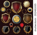 golden shields  laurels and... | Shutterstock .eps vector #202481035