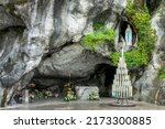 Small photo of Statue of Virgin Mary in the grotto of Our Lady of Lourdes, France