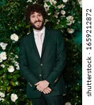 Small photo of Los Angeles, CA - Feb 27, 2020: David Andrew Burd aka Lil Dicky attends the premiere of FXX's "Dave" at Directors Guild Of America