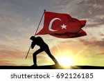Turkey Flag Being Pushed Into...