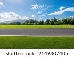 Empty asphalt road and forest with mountain nature landscape under blue sky