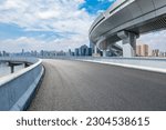 Asphalt road highway with city skyline scenery