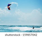 Kitesurfing Or Kiteboarding
