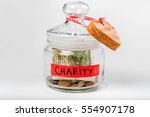 Jar With Money With A Charity...