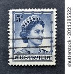 Small photo of Australia, circa 1959 : Postage stamp printed by Australia, that shows portrait of queen Elizabeth, circa 1959.