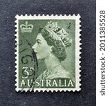 Small photo of Australia, circa 1959 : Postage stamp printed by Australia, that shows portrait of queen Elizabeth, circa 1959.