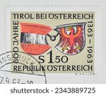 Small photo of Austria - circa 1963 : Cancelled postage stamp that celebrates Tyrol’s Union with Austria, 600th Anniversary circa 1963.
