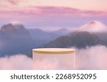Small photo of Surreal podium outdoors on sky pink pastel soft cloud with misty mountain nature landscape background.Beauty cosmetic product placement pedestal present minimal display,summer paradise dreamy concept.