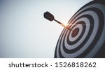 Small photo of Bullseye is a target of business. Dart is an opportunity and Dartboard is the target and goal. So both of that represent a challenge in business marketing as concept.