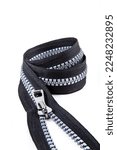 Small photo of Jacket Winter Coat Black Tape Heavy Duty Zippers Large Molded Plastic Zippers. Close-up of zipper slider on a white surface. Sewing production, materials and accessories.
