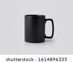 Black Ceramic mug on white background. Blank drink cup for your design.