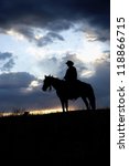 Cowboy On Horseback ...