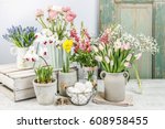 Spring Flowers On Wooden Table. 