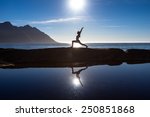 stock-photo-caucasian-woman-is-doing-yoga-excercises-against-picturesque-landscapes-in-norway-250851868.jpg