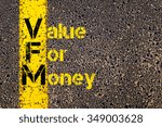 Small photo of Concept image of Accounting Business Acronym VFM Value For Money written over road marking yellow paint line.