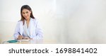 Small photo of Women doctor smile on coat isolate wide white background concept people working check for Coronavirus in medical hospital health care, Modern Nurse in medicos clinic business service. covid19
