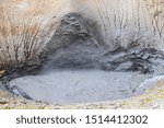 Small photo of Boiling, sulphurous, clayish pool of Mud Volcano geyser at Yellowstone National Park.