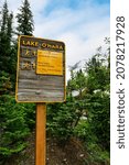 Small photo of Hiking guideboard for trekking at Lake O’Hara Area in Yoho National Park, Canadian Rockies, British Columbia, Canada