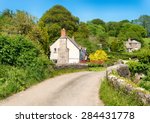 Cottages On A Country Lane At...