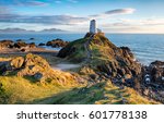 The lighthouse on Llanddwyn Island near Newborough on the Anglesey coast in Wales