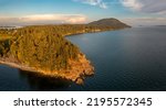 Small photo of Sunset Aerial View of the West Side of Lummi Island, Washington. Located in the Salish Sea amid the San Juan Islands is this jewel of an island paradise. Fishing and fine dining highlight this getaway