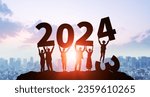 Small photo of Multinational people holding up the year 2024. 2024 New Year concept. New year's card 2024.