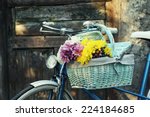 Old Bicycle With Flowers In...