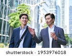 two asian business people... | Shutterstock . vector #1953976018