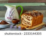 Small photo of Sweet marbled brioche plait with nuts and chocolate
