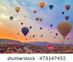 Hot Air balloons flying over Mountains landscape sunset vintage nature background